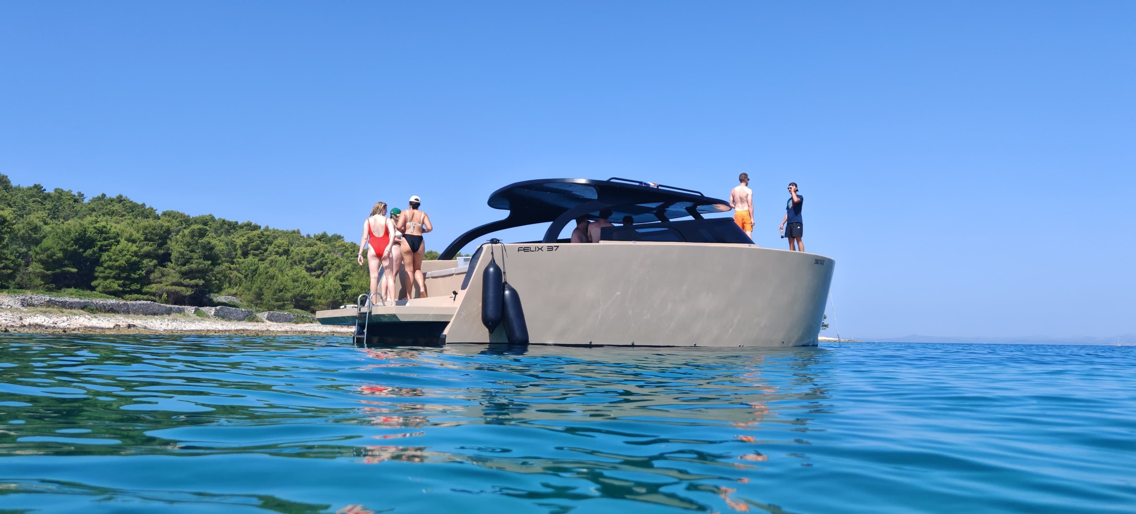 Rebelde boats contact photo featuring sunset from boat sundeck