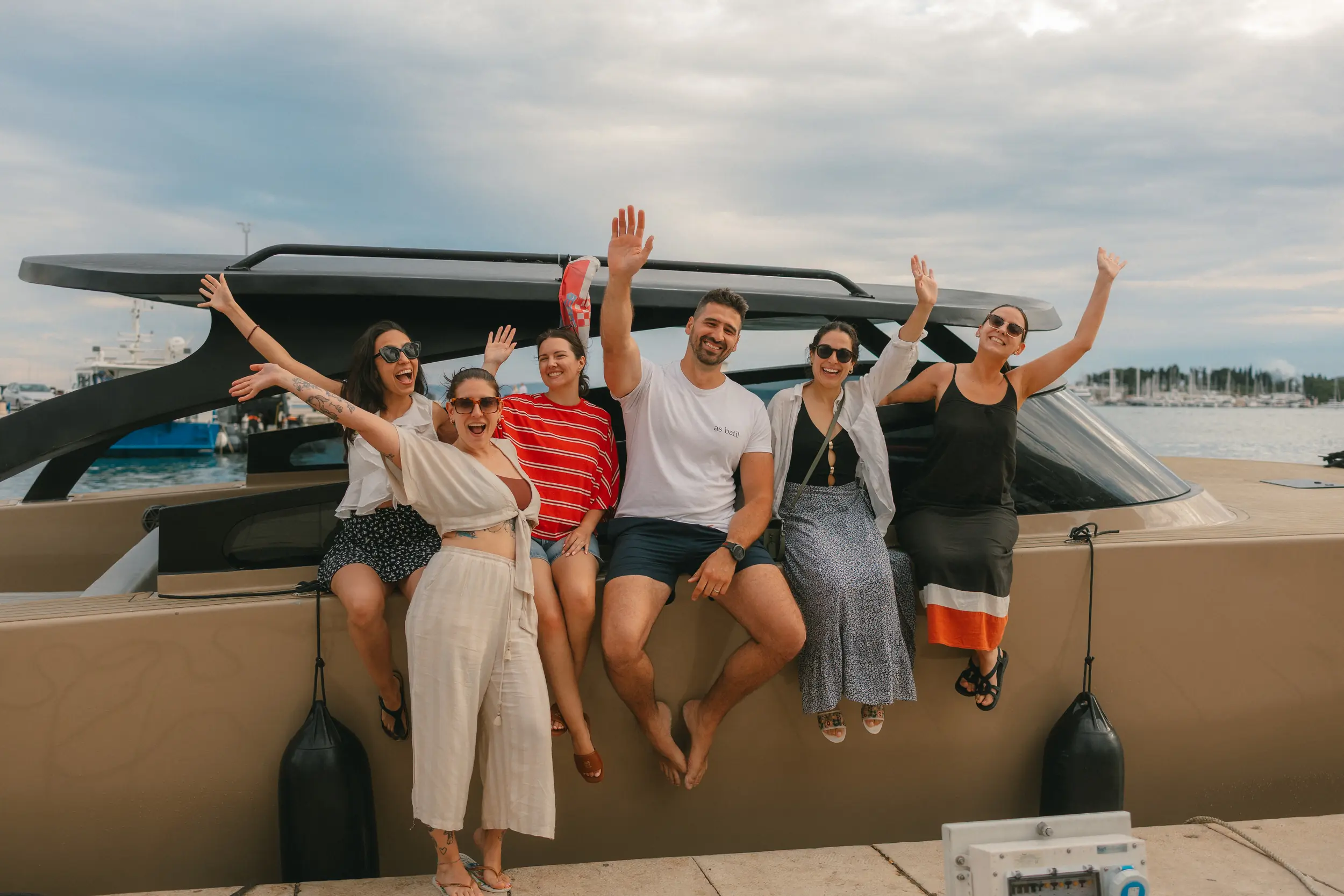 Rebelde Boats crew and guests on deck during a private Adriatic charter from Split